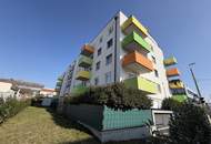 Moderne & zentrale 2-Zimmer-Eigentumswohnung mit Garten und Tiefgaragenplatz