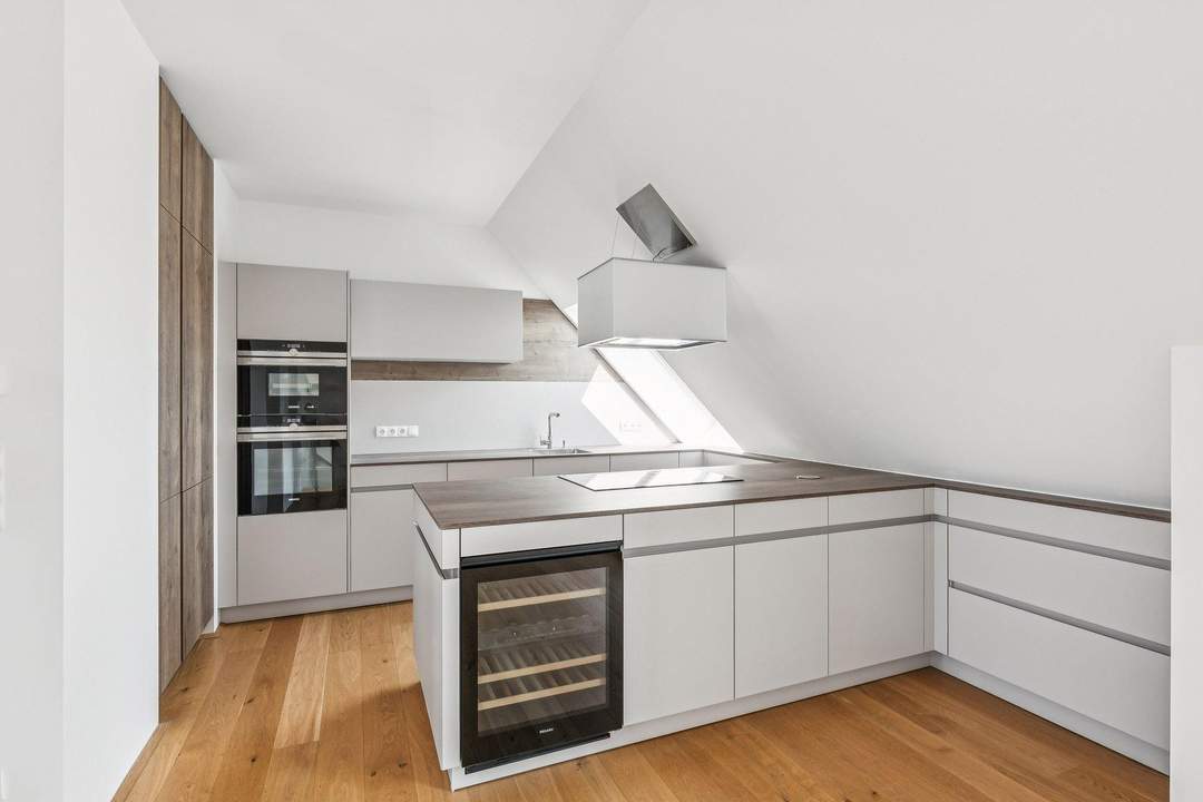 Exklusive Dachgeschoss-Maisonette im revitalisierten Altbau – hochwertiges Wohnen auf zwei Ebenen