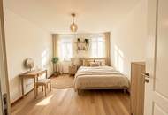 Modern gestaltete Altbauwohnung mit großzügigem Wohnbereich und südseitigen Außenflächen
