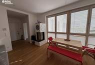 Neuwertige 2-Zimmer-Eigentumswohnung mit Kamin, Loggia und Garage