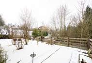 Hochwertige 3-Zimmer-Wohnung mit Tischlerküche, 160 m² Eigengarten, Terrasse und Garage in ruhiger, grüner Lage!