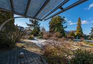 Ruhelage: Gepflegter Bungalow mit Wintergarten und Doppelgarage