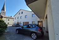 Mehrfamilienhaus mit Geschäftslokal