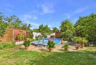 Entzückendes Zweifamilienhaus mit Pool, traumhaftem Garten und Garage in toller Lage in Tribuswinkel zu kaufen!