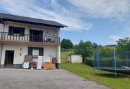 Zweifamilienhaus mit Nebengebäuden – Option: Kauf von 9.937 m² angrenzender landwirtschaftlicher Fläche möglich
