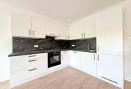 Provisionsfreier Erstbezug! Zweizimmerwohnung mit Balkon und Garagenplatz