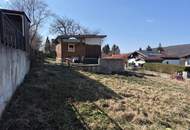 SONNIGER BAUGRUND MIT ABRUCHOBJEKT