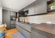 Moderne 100 m² Kohlbacher Neubauwohnung mit Balkon und TG-Platz (barrierefrei)