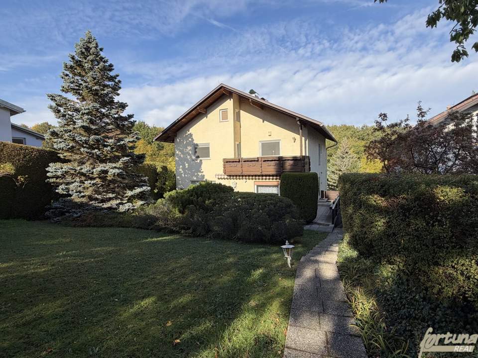 Einfamilienhaus mit unverbaubarem Waldblick auf großzügigem Hanggrundstück in Breitenfurt