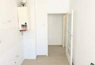 Direkt am Schweizergarten: Schöne 2-Zimmer-Wohnung mit separater Küche