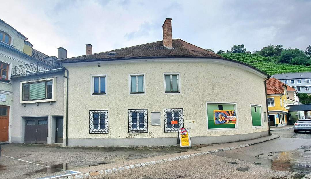GESCHÄFTS- & WOHNHAUS