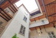 Charmante 2-Zimmer-Altbauwohnung mit Balkon in zentraler Lage