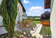 High-end living in a peaceful green location! A feel-good retreat in a class of its own: tradition meets state-of-the-art comfort!