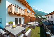 Sonnenverwöhnte Neubauwohnung mit Gartenidylle und Bergblick