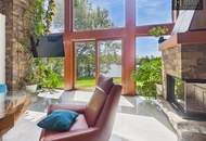 An Exceptional Waterfront Retreat with Private Beach and Unrivaled Privacy