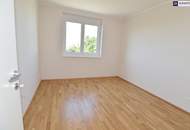 Ruhiger Zwei-Zimmer-Erstbezug mit großen Glasfronten und viel Qualität!