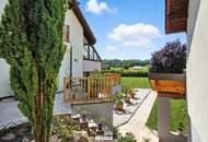 High-end living in a peaceful green location! A feel-good retreat in a class of its own: tradition meets state-of-the-art comfort!