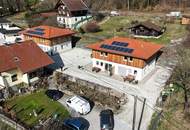 Etabliertes Ferienhaus-Ensemble am Millstätter See. Zwei moderne Häuser mit bestehender Vermietung. Investment.