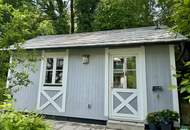 Großer Eigengarten: 4-Zimmer-Wohnung mit Saunahäuschen