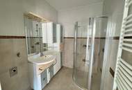 Vermietete Anlegerwohnung mit Balkon und moderner Küche in zentraler Lage