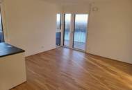 Exklusiver Neubau im 10. Stock mit Seeblick, Kochinsel & großzügigem Balkon – moderne 3-Zimmer-Wohnung
