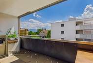 Grenznah wohnen: Moderne Terrassenwohnung für Pendler und Genießer