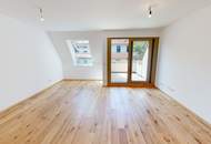 STUDIO-WOHNUNG mit Balkon! I Stellplatz in hauseigener Tiefgarage I hochwertige Einbauküche I Fußbodenheizung I bodenebenerdige Dusche I U1 ca. 13 min. mit Öffis