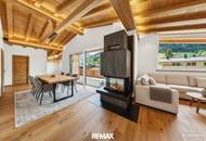 Mit dem Lift direkt in Ihr neues exklusives Penthouse mit Glaskamin und Traum Ausblick in Aurach bei Kitzbühel -