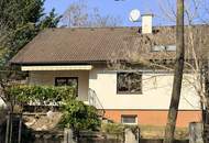 Traumhafte Grünruhelage in einer Sackgasse: Voll unterkellertes Familienhaus mit Carports