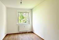 Erstbezug nach Sanierung: 3 Zimmer Wohnung mit Balkon und Garage