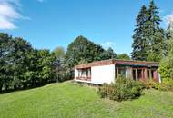 ARCHITEKTUR TRIFFT NATUR - BUNGALOW MITTEN IN DER NATUR UND GUTER INFRASTRUKUR