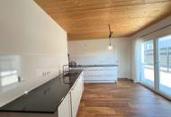 Moderne Gartenwohnung mit großzügigen Terrassen in sonniger Ruhelage