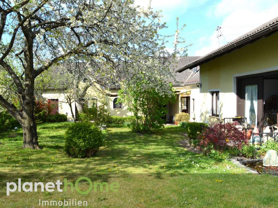 Ebenerdiges Wohnhaus inklusive Einliegerwohnung und romantischem Bauerngarten!