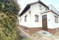 Einfamilienhaus mit Gartenparadies und Bächlein im Herzen von Walding