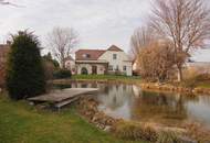 Exquisites Einfamilienhaus mit großem Garten und Schwimmteich