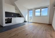 Erstbezug | Sonnige 3-Zi-DG-Wohnung mit Wien-Blick + 8m² Balkon | Klima | Lift