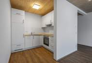 Neuwertige Gartenwohnung mit Terrasse &amp; Tiefgarage