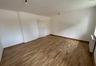 Modernisiert - hochwertig - durchdacht: diese 2,5-Zimmer Wohnung in hervorragender Lage überzeugt mit stilvoller Sanierung, ebenerdiger Dusche, hochwertigen Böden und viel Stauraum im großzügigen Kellerabteil - perfekt für Paare oder kleine Familien!