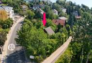 Am Satzberg: Eckgrundstück in Westlage mit Abbruch-Sommerhaus