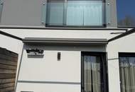 luxoriöse Doppelhaushälfte mit Boot-Anlegeplatz