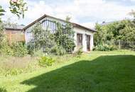 Einfamilienhaus mit Gartenparadies und Bächlein im Herzen von Walding