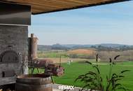 Architektenhaus in sonniger Ruhelage mit Spiral-Weinkeller, Infinity Pool, Burgblick und ca. 1 ha Eigengrund