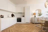 Innenarchitektonisch gestaltete 2-Zimmer-Musterwohnung mit Wohnküche und Terrasse