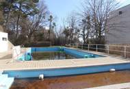 Großzügige Wohnung mit Loggia, Swimmingpool und Garagen in top Lage