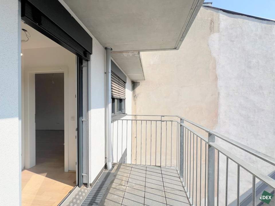 2-Zimmer-Neubauwohnung mit Balkon in Hofruhelage