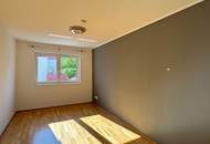 Modernes Wohnhighlight im Grünen: 3-Zimmer mit Garten-Balkon und 2 Garagenplätzen