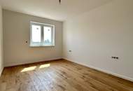 Erstklassige 73.8m² Wohnung mit Balkon in Mannswörth, Perfekt für Erstbezug!