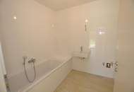 Moderne, sonnige Erdgeschoßwohnung mit Eigengarten und Tiefgarage