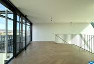 Spektakuläre Dachgeschoßmaisonette mit Terrassentraum und Blick auf die Canisiuskirche