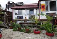 Einfamilienhaus mit drei eigenständigen Wohnungen und einzigartigem Erlebnisgarten